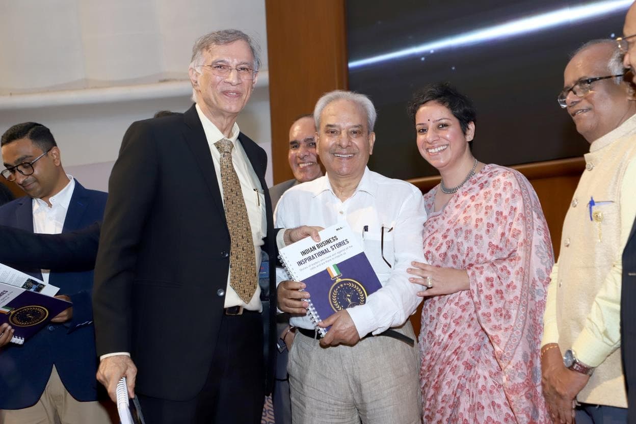 Mr. Bhat receiving the BLLP award
