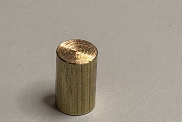Turned brass bush