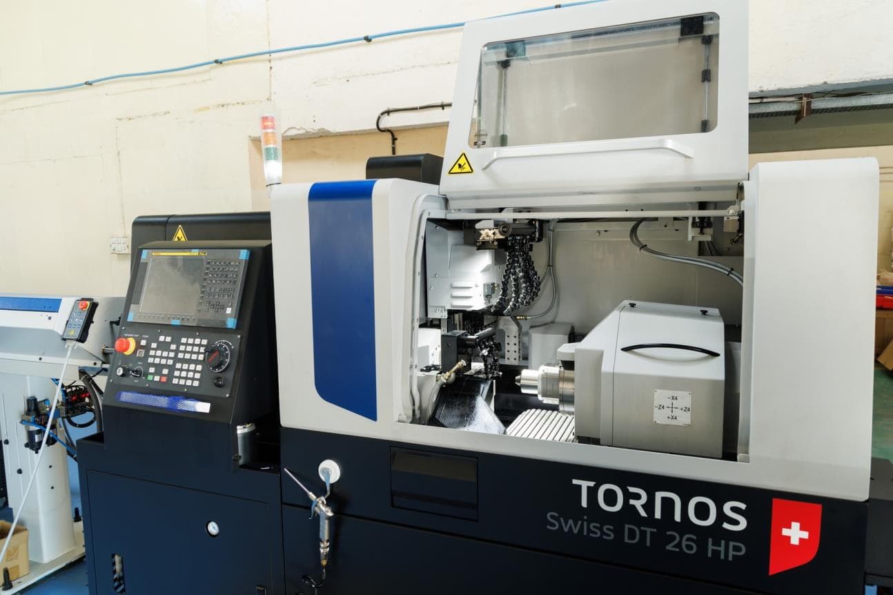 CNC Swiss sliding head machines
