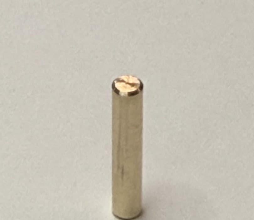 Turned brass pin